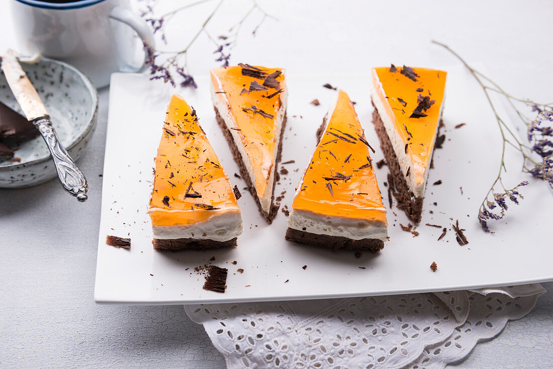 Vegan mango and passion fruit quark cake with a chocolate base