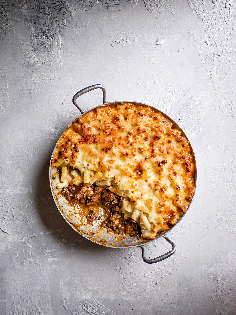Mac and cheese with a hidden layer of rich beef ragu