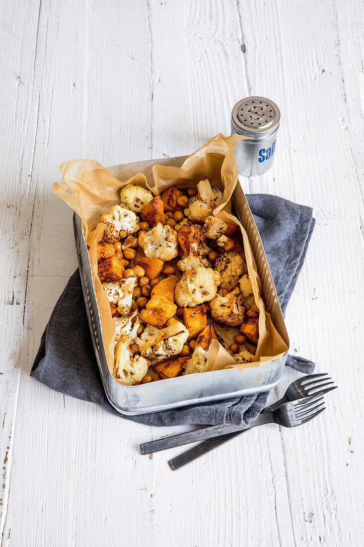 Roasted cauliflower with sweet potatoes and chickpeas