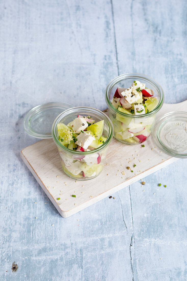 Quick summer salad with cucumber, radishes and feta