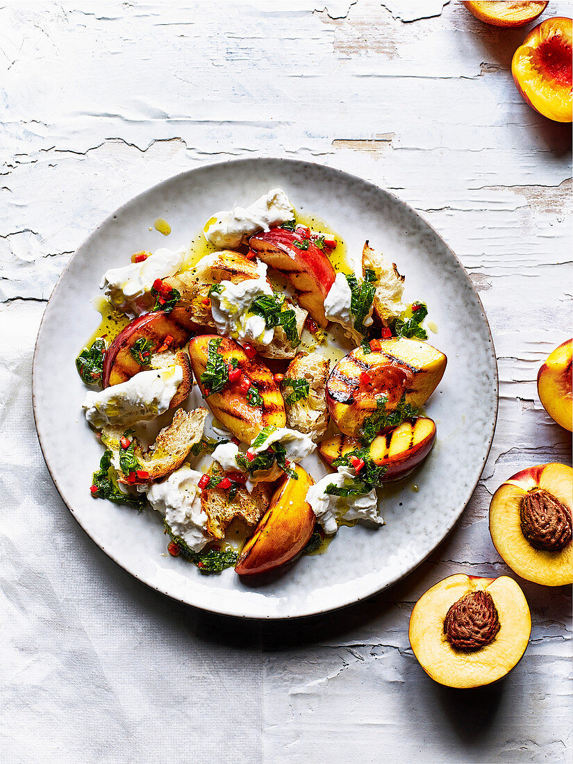 Grilled nectarines with burrata, chilli and mint