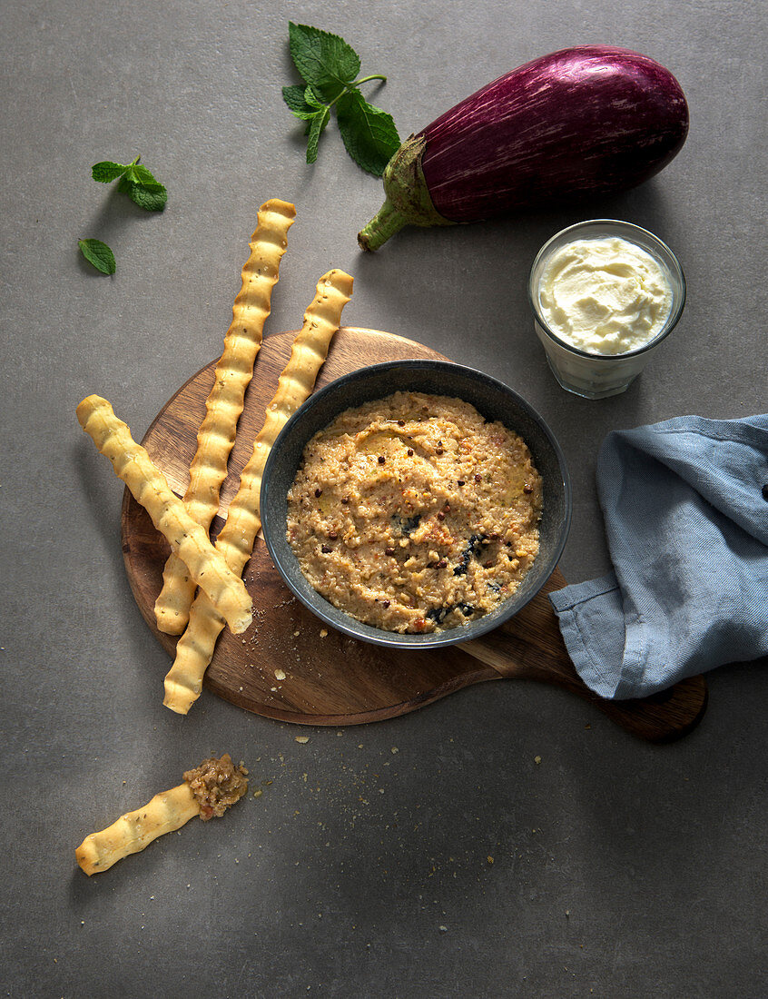 Eggplant and mint dip with breadsticks