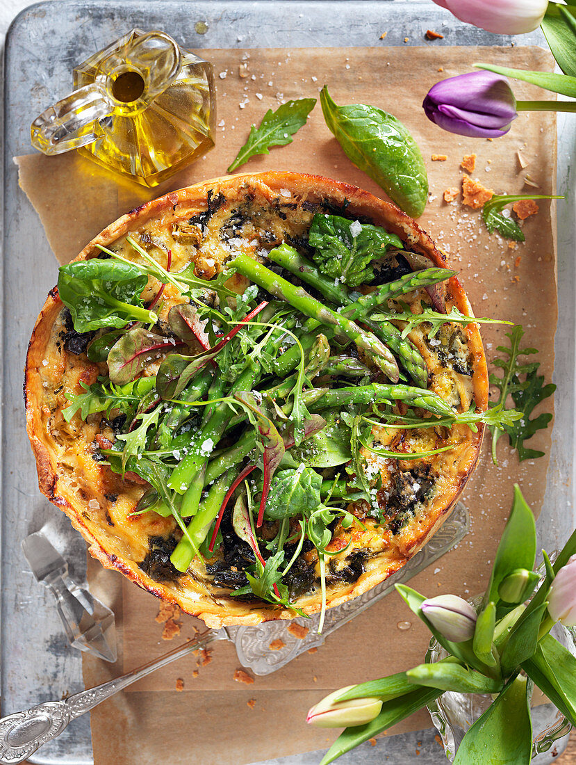 Spring pie with asparagus, spinach and arugula,