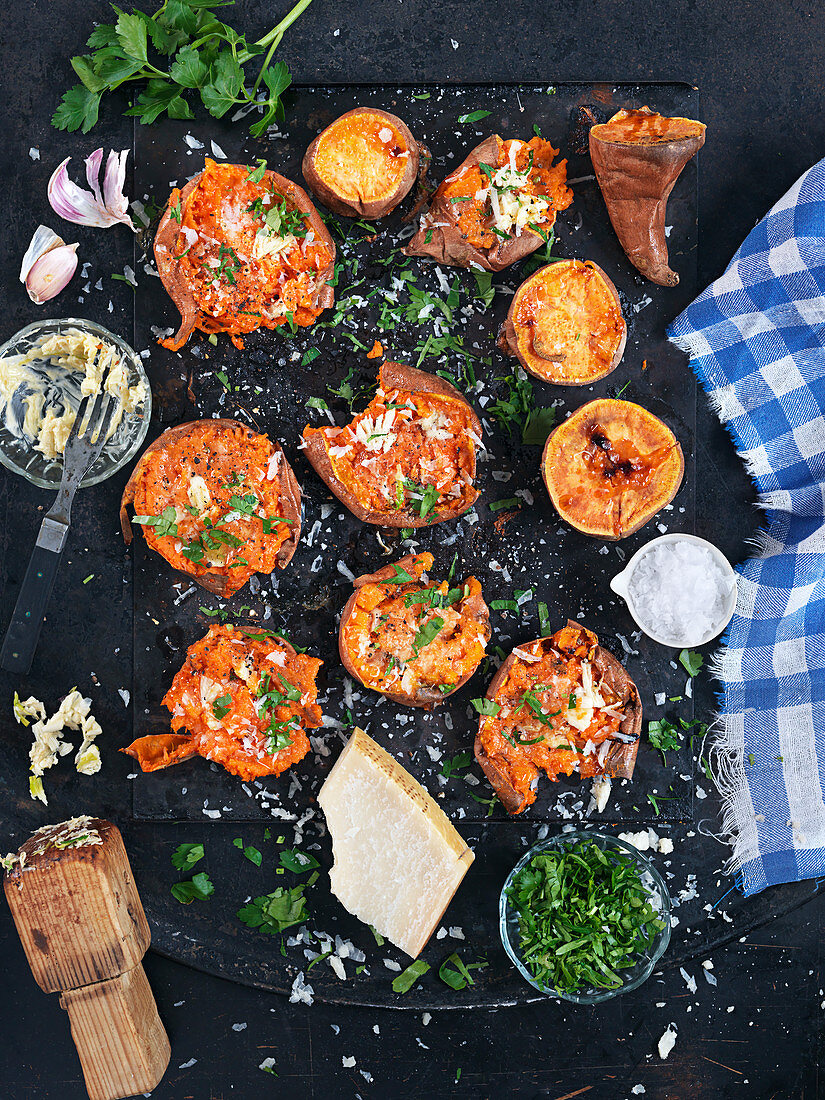 Baked sweet potatoes with garlic, parsley and parmesan