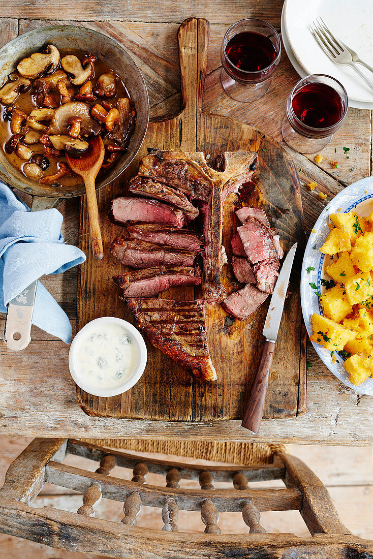 T-bone steak, mushrooms and marsala with deep-fried polenta and gorgonzola fonduta