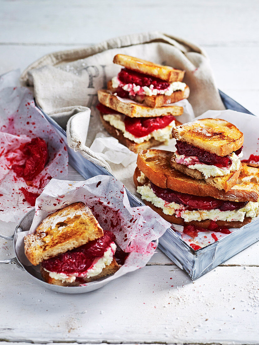 Squashed plum and ricotta sandwiches