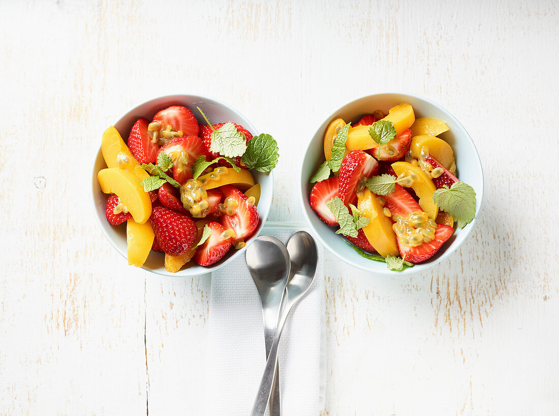 A summer breakfast with peaches and strawberries