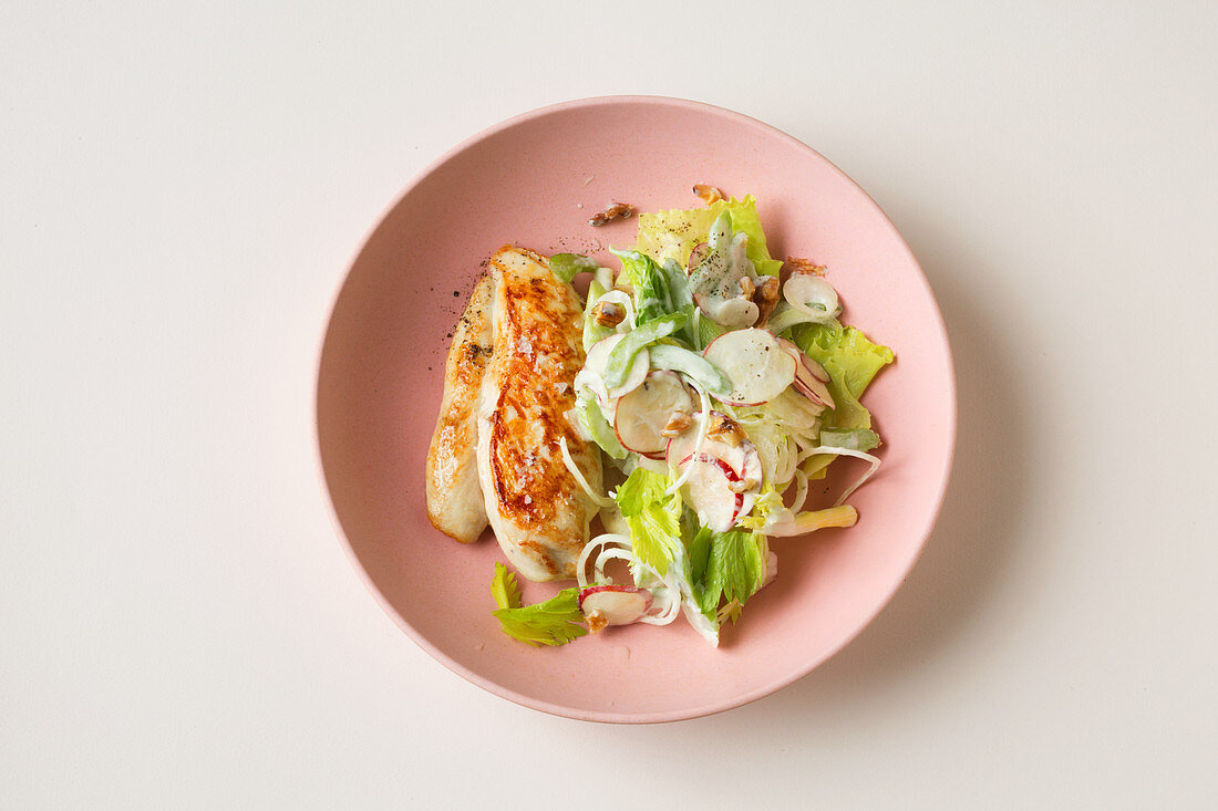 Fried chicken breast with a Waldorf salad (keto cuisine)
