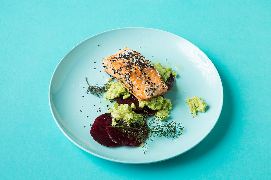 Salmon fillet on beetroot carpaccio and avocado cream (keto cuisine)