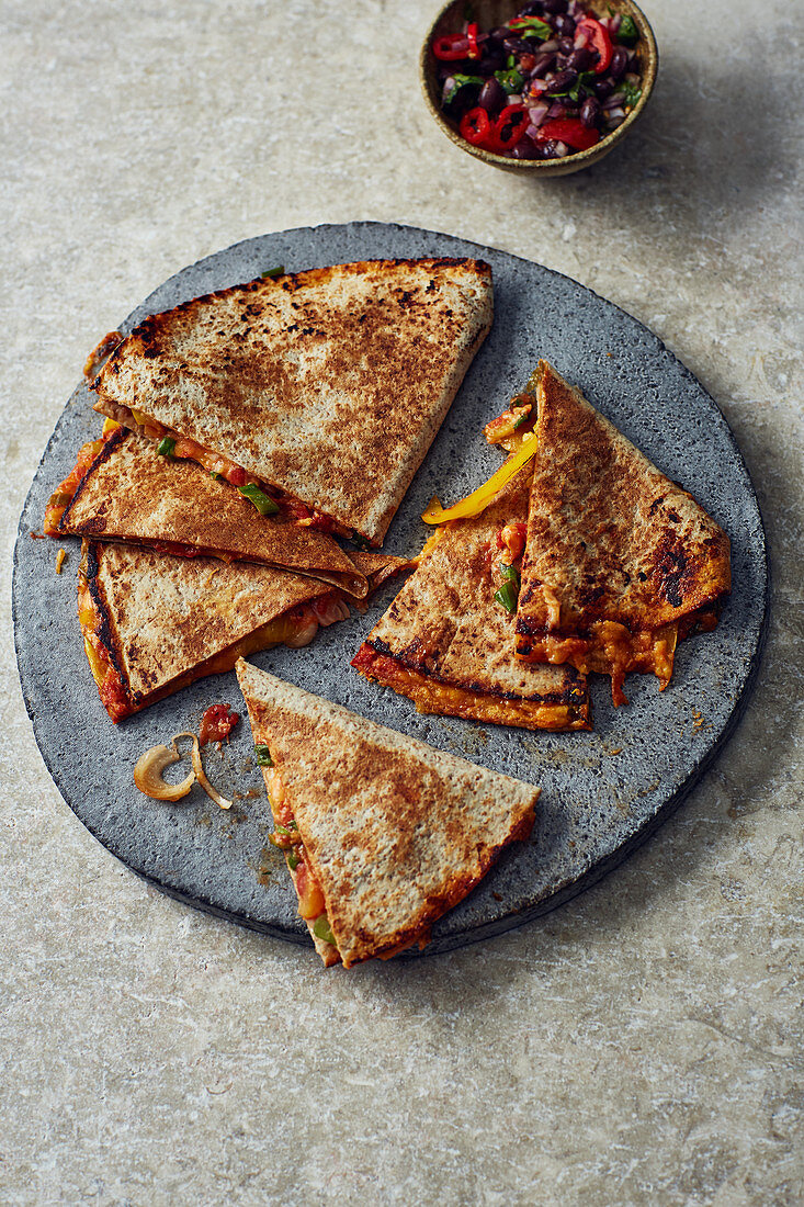 Vegetarian quesadillas with peppers, tomatoes and cheese