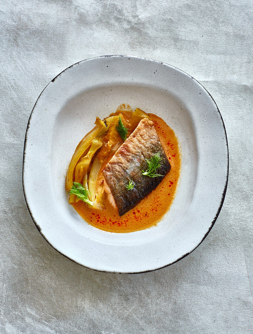 Char fillets with a fennel medley in a massaman broth