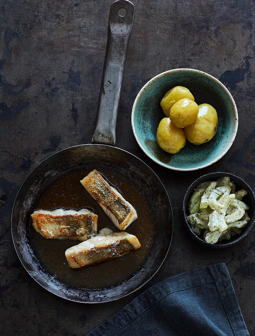 Fried zander fillet with mustard gherkins and new potatoes