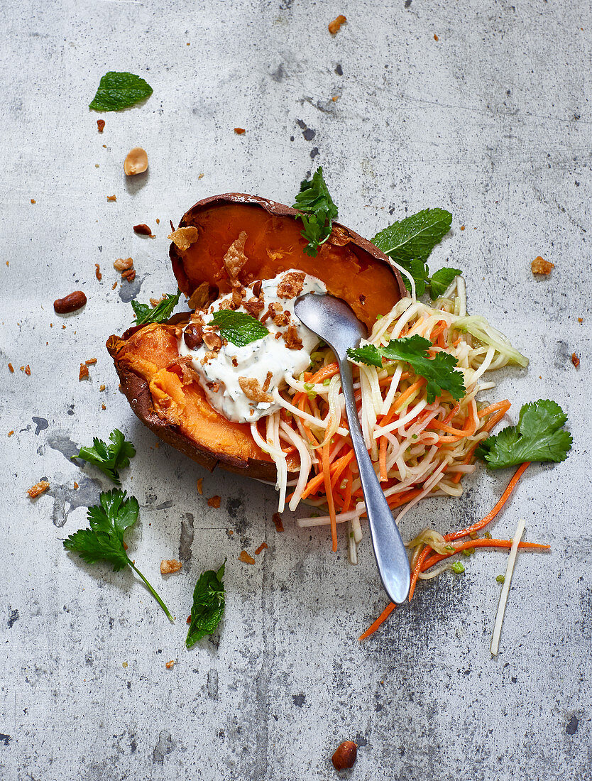 Stuffed roast sweet potatoes with sour vegetables and herb quark