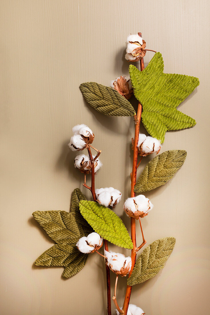 Hand-sewn corduroy leaves on cotton plant stems