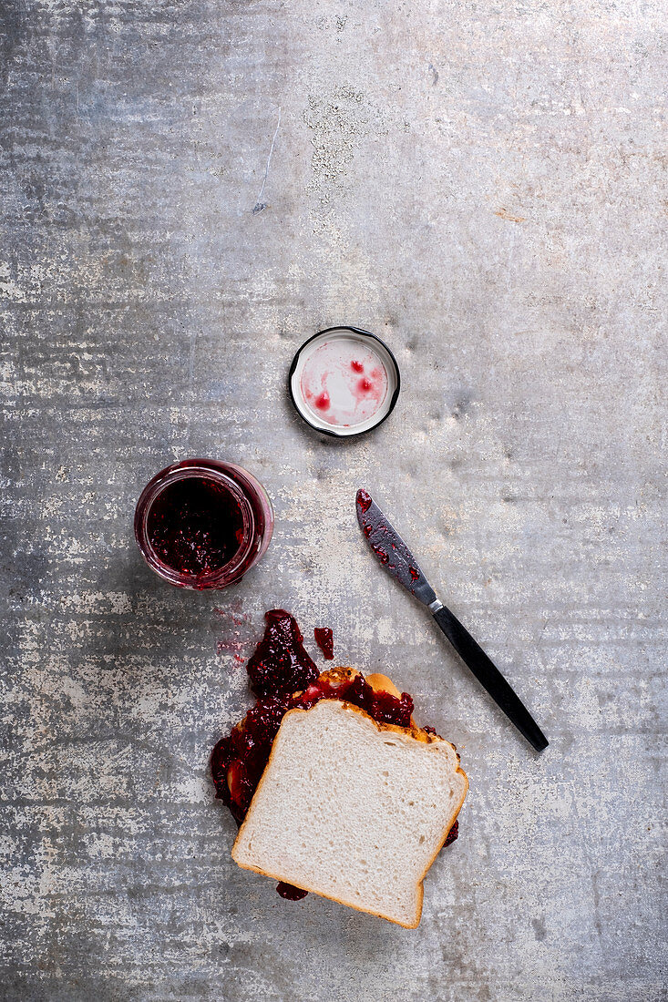 Making a raspberry jam sandwich