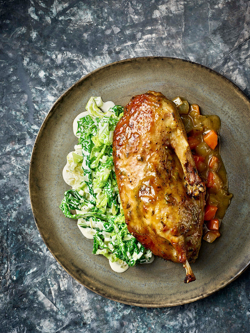 Crispy honey-glazed duck with an orange filling and a Savoy cabbage medley
