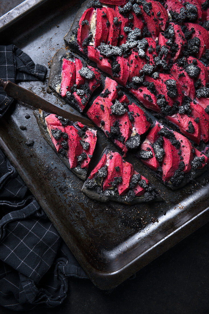 Black apple pie with Red Moon apples and streusel for Halloween