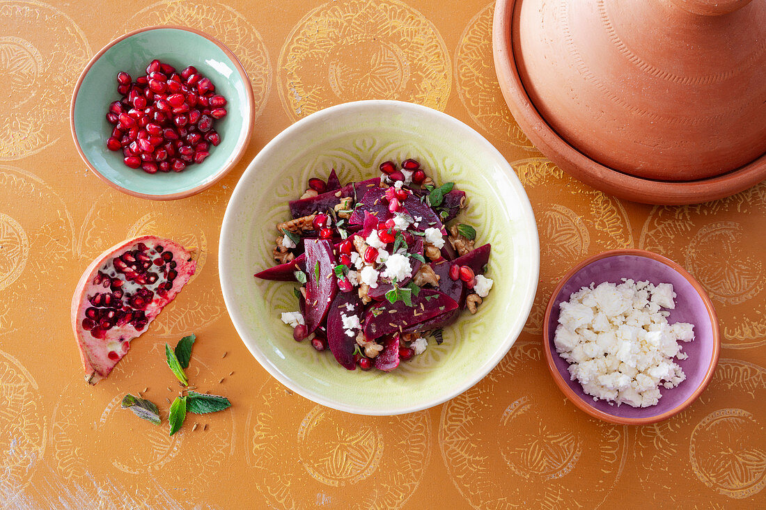 Beetroot salad with walnuts, pomegranate seeds and feta cheese