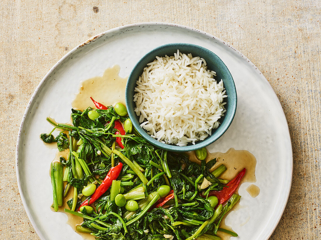Thai water spinach with soya beans cooked in a brazier