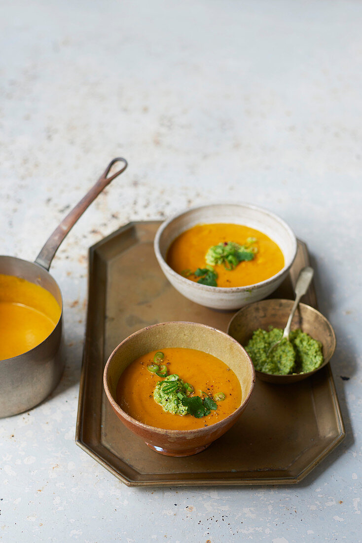 Curried carrot soup with cashew and coriander salsa