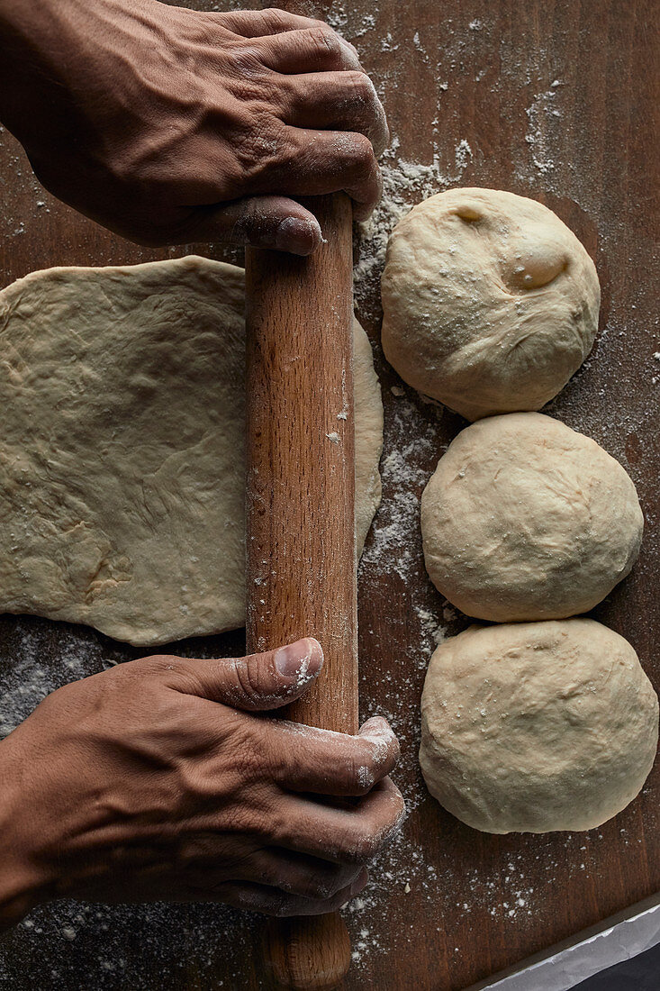 Rolling out sourdough with a rolling pin