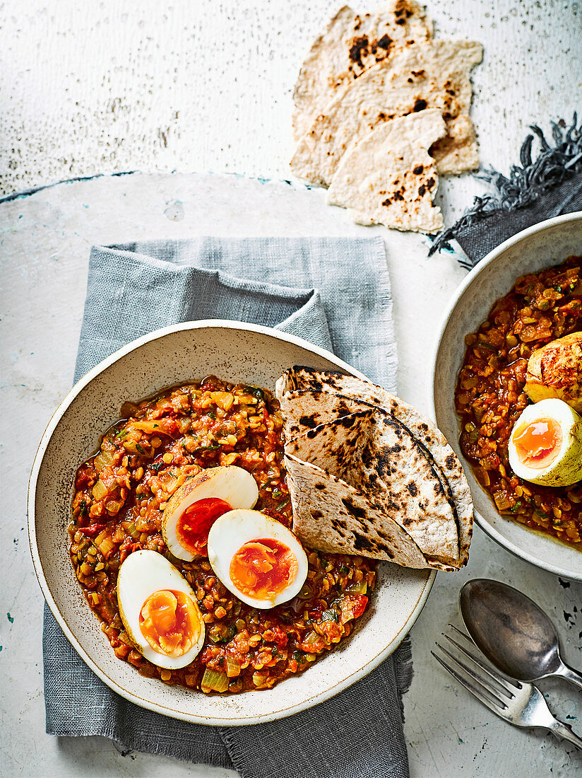 Spicy lentil curry with eggs and chapati