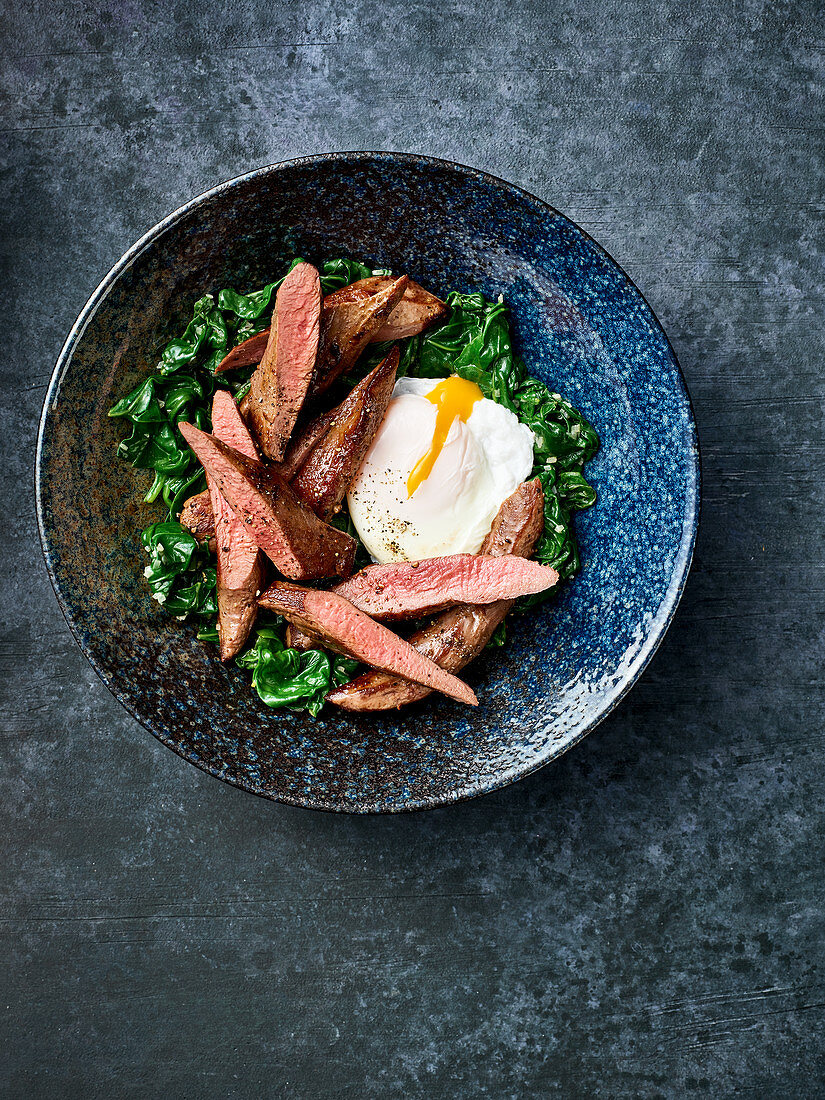 Wild boar fillet with spinach and a poached egg