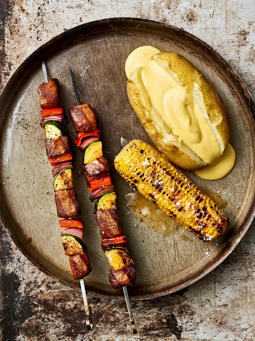 Colourful grilled venison skewers with corn-on-the-cob and an aioli potato