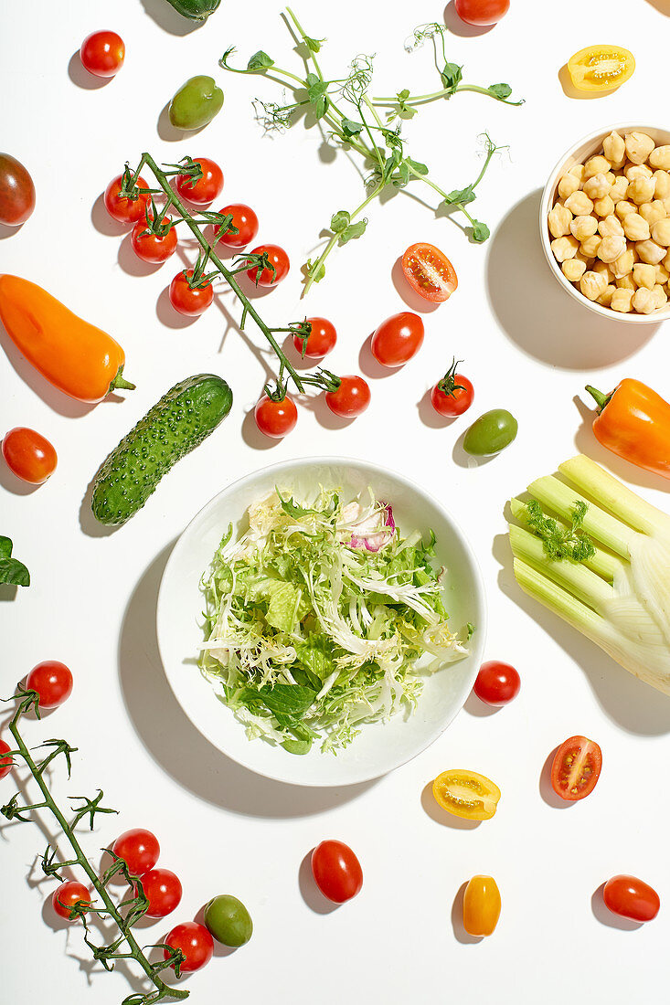 Healthy salad ingredients on white background