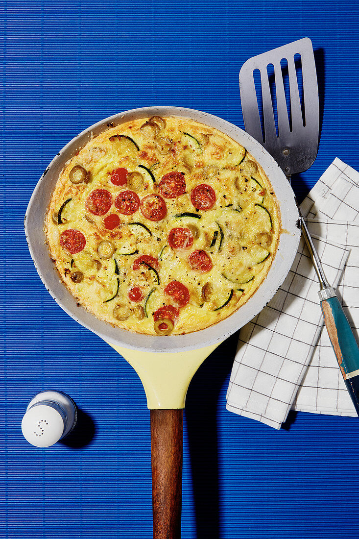 Vegetable frittata with tomatoes and courgettes