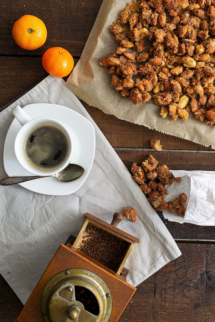 Roasted almonds, mandarins and coffee