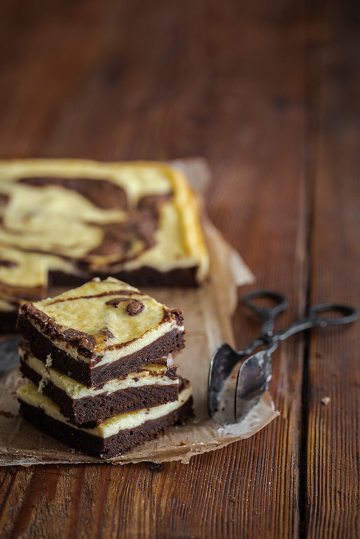 Cheesecake brownies on baking paper