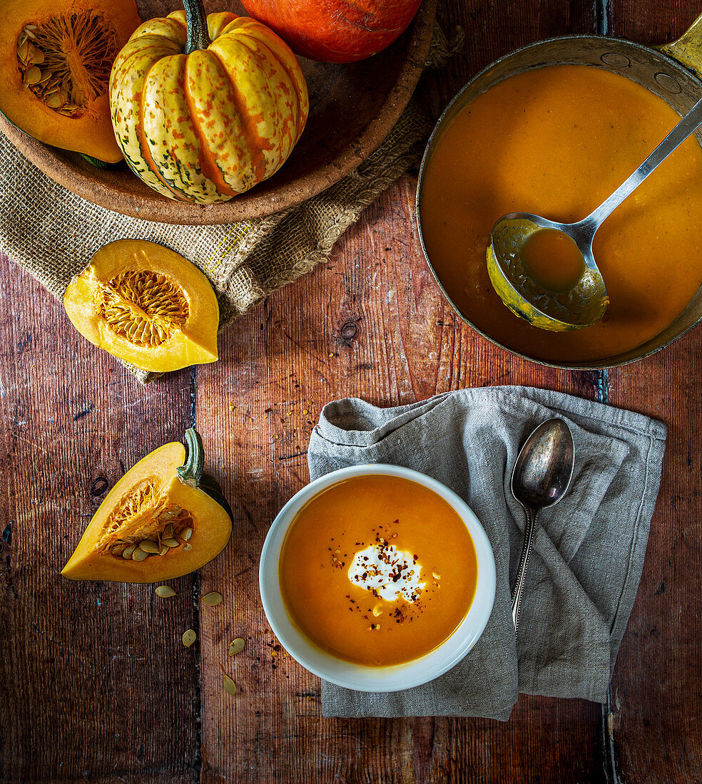 Pumpkin and squash soup with yoghurt and chilli flakes