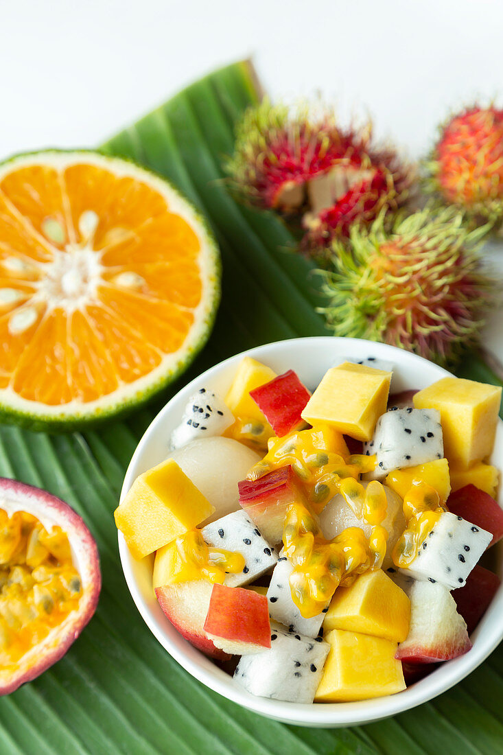 Exotic fruit salad with dragon fruit, mango and passion fruit