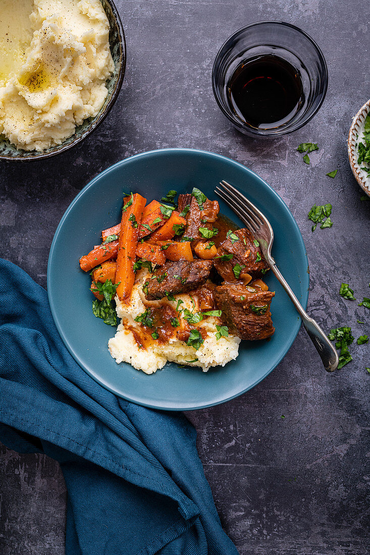 Braised beef with carrots and mashed potatoes