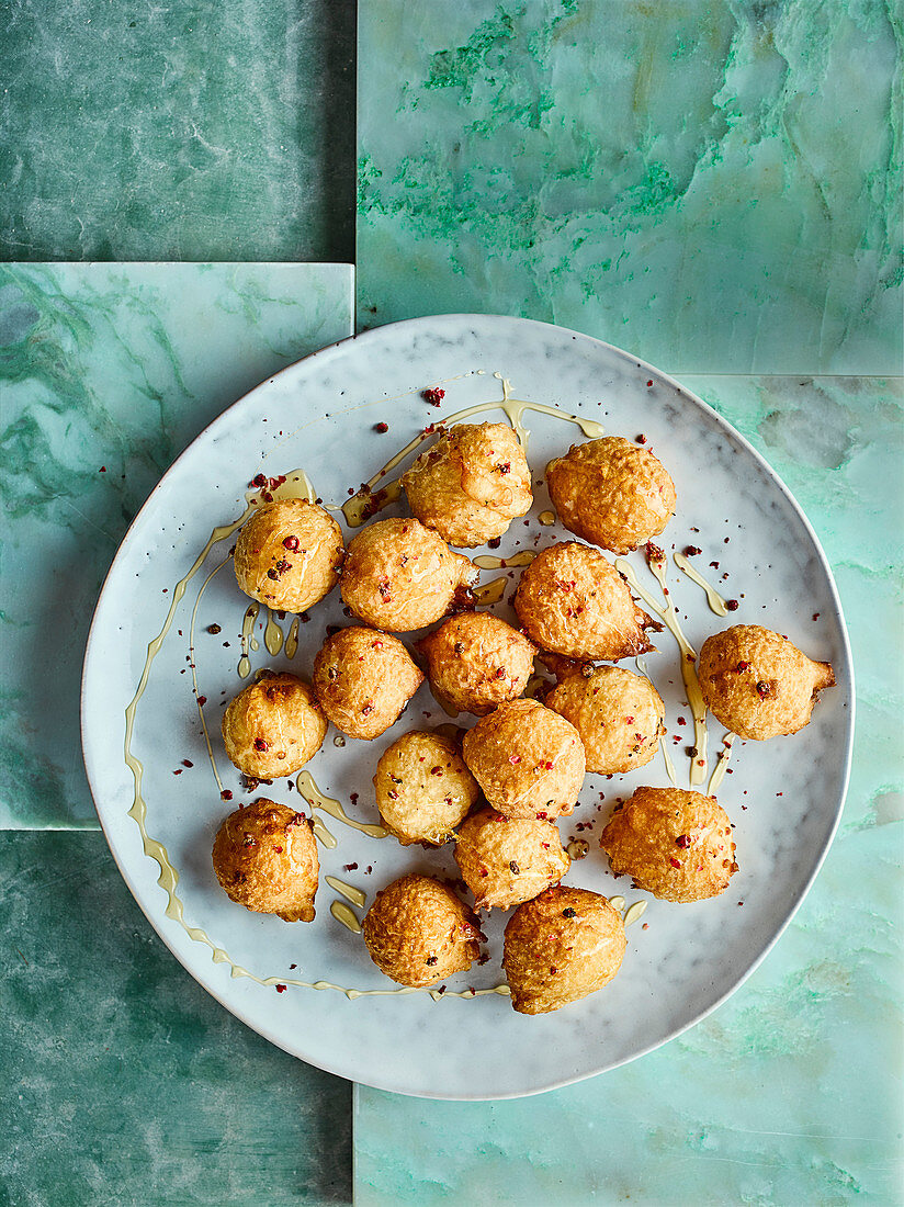 Deep-fried goat's cheese with pink peppercorn honey