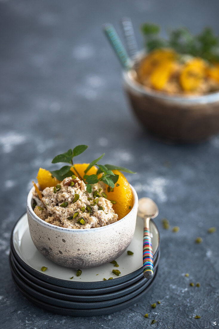 Orange couscous with mint and chopped pistachios