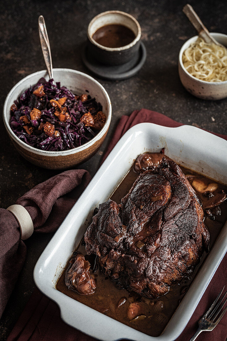 Braised beef with red cabbage, pasta and sauce