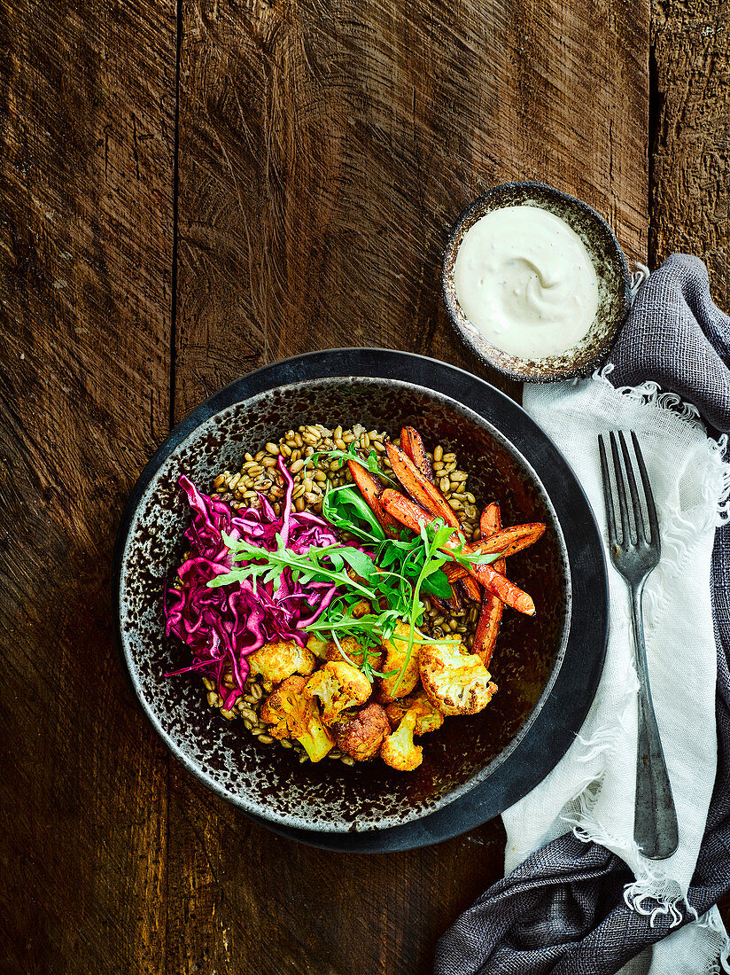 Vegeterian Buddha bowl salad with yogurt