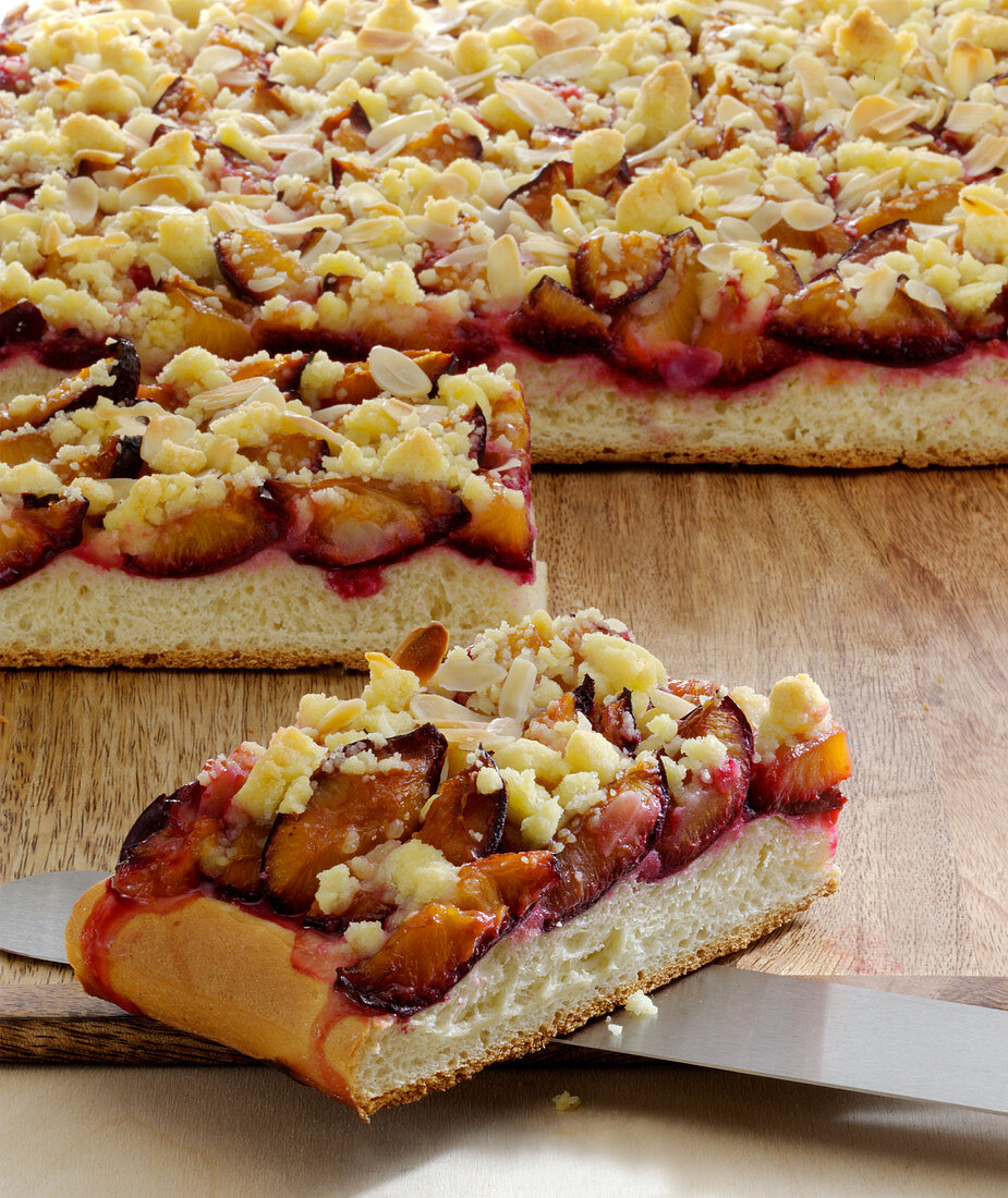 Plum cake with crumble baked in a tin