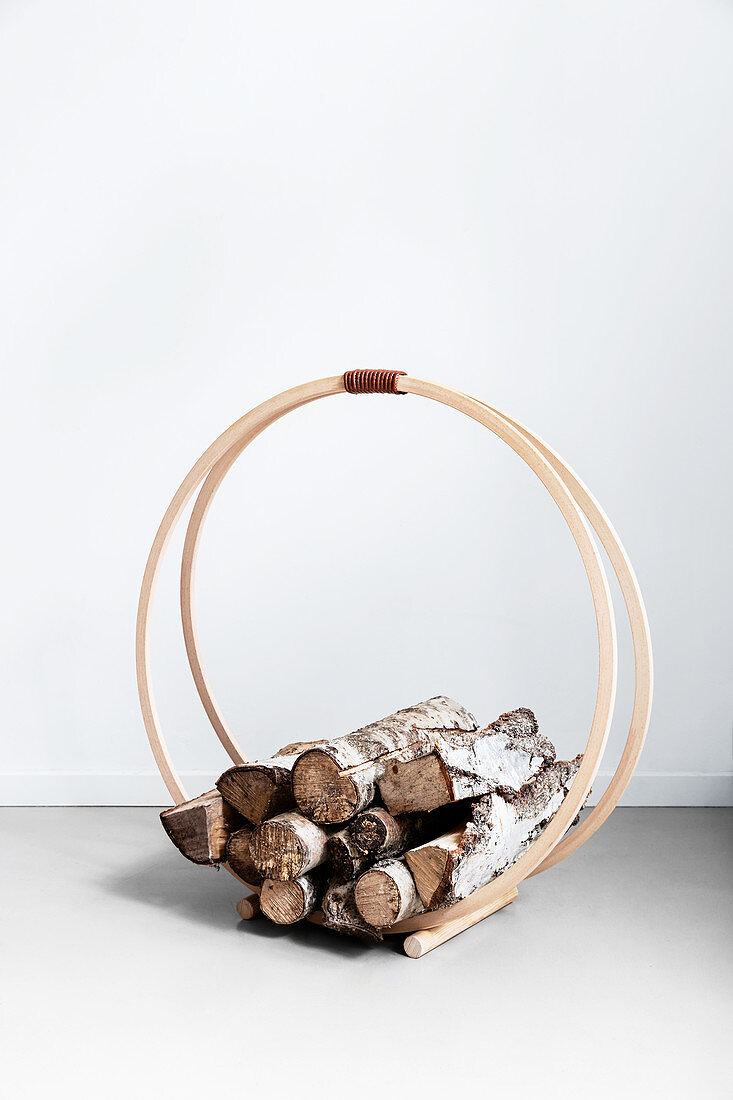 DIY firewood rack made from hulahoops