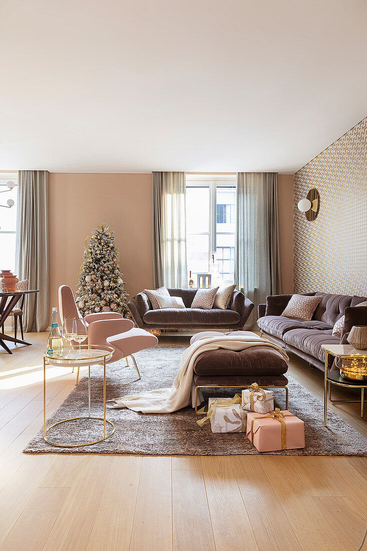 Elegant living room decorated in pink, gold and mauve at Christmas