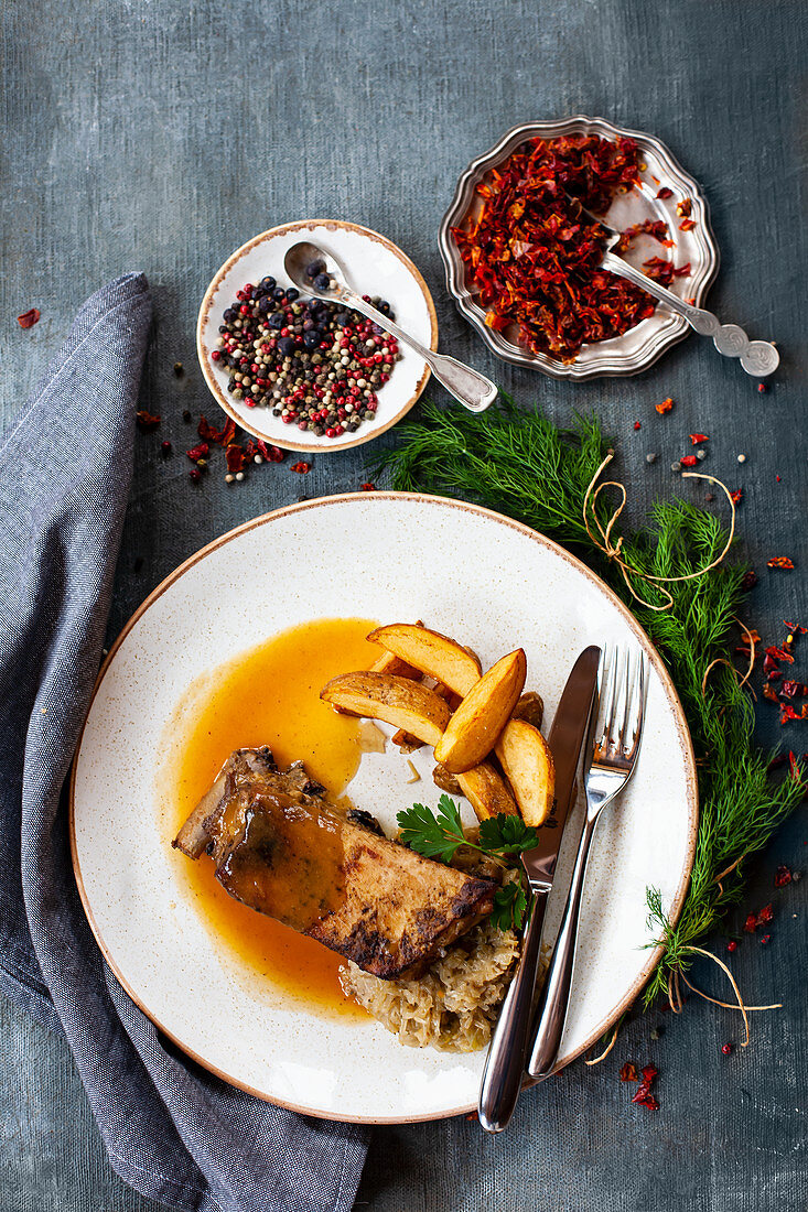 Roasted pork ribs with fried cabbage