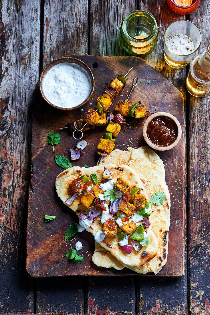Turmeric and coconut paneer with charred naans