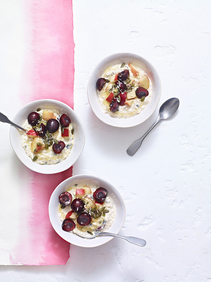 Overnight bircher muesli with cherries, peach and coconut