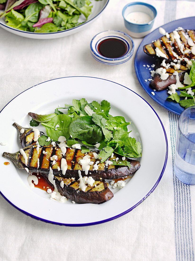 Za’atar aubergine steaks with sesame dressing and pomegranate