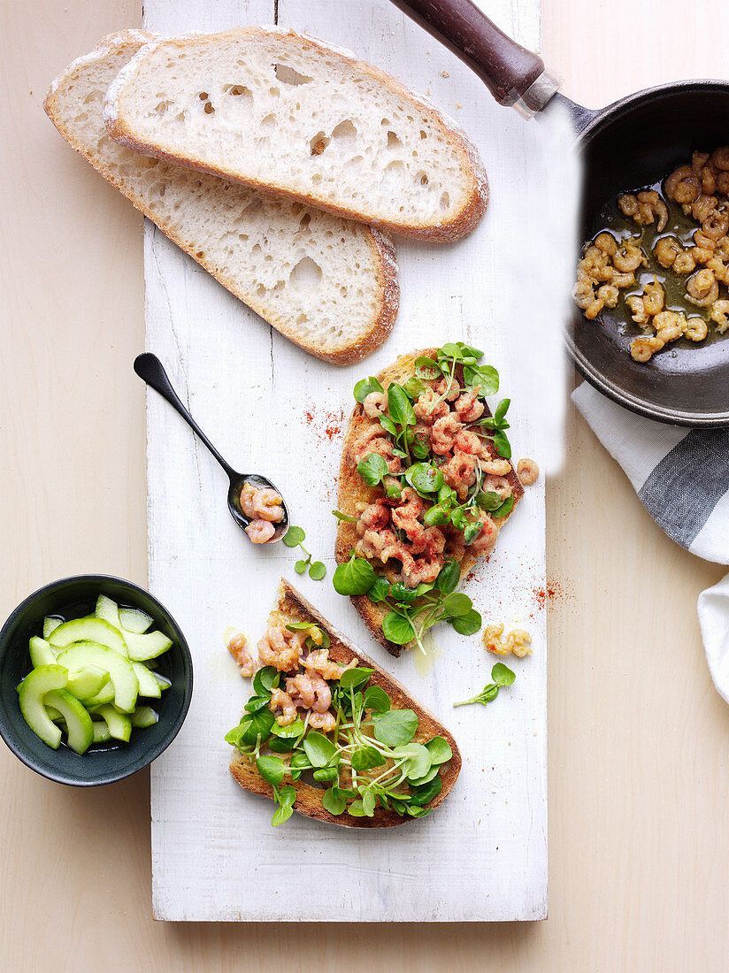 Potted shrimp on toast with pickled cucumber
