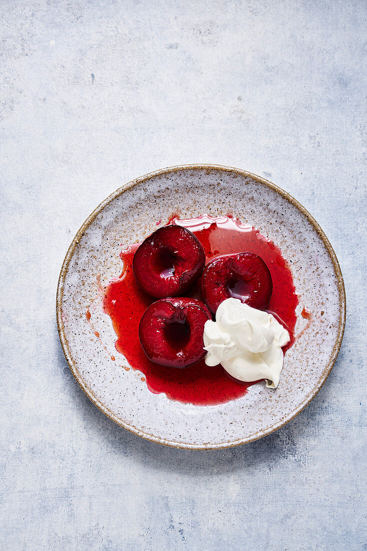 Marsala-baked plums with chantilly cream