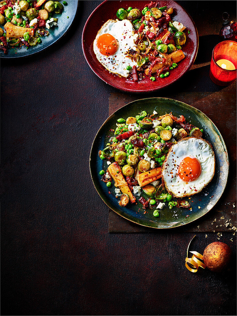 Caramelised onion, sprout and bacon hash with chilli fried eggs