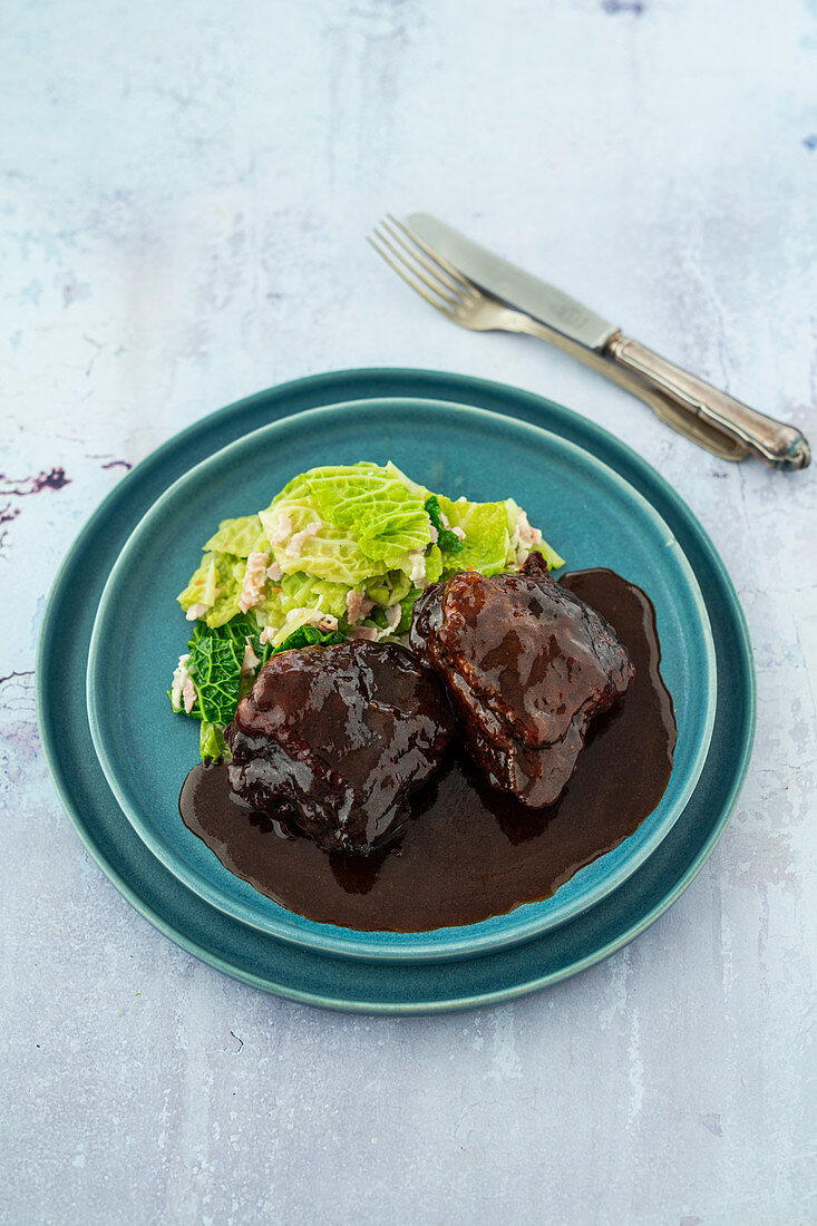 Braised veal cheeks with savoy cabbage